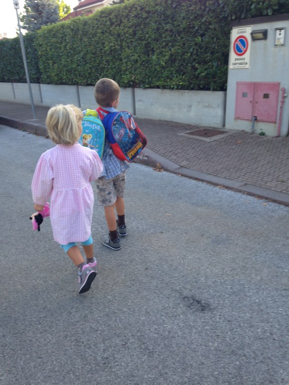 Two cutie pies on their first day of school. Sweet brother carrying his sister's backpack. A little southern gentleman in the making.